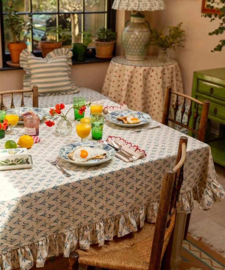 Ruffled tablecloth in at rustic dining room setting