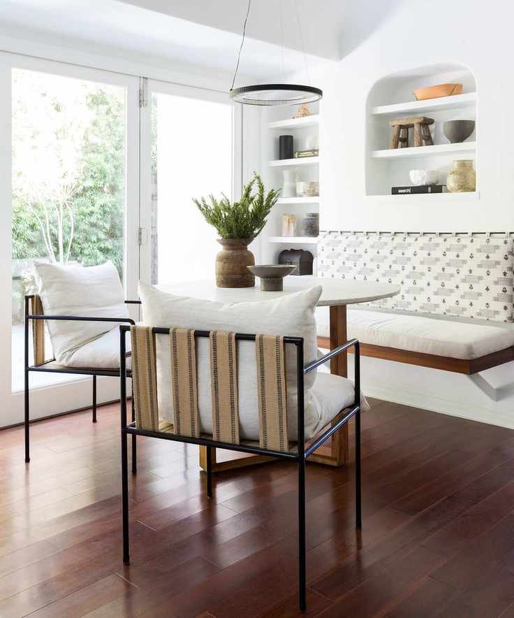 Bright dining room with dark wood flooring