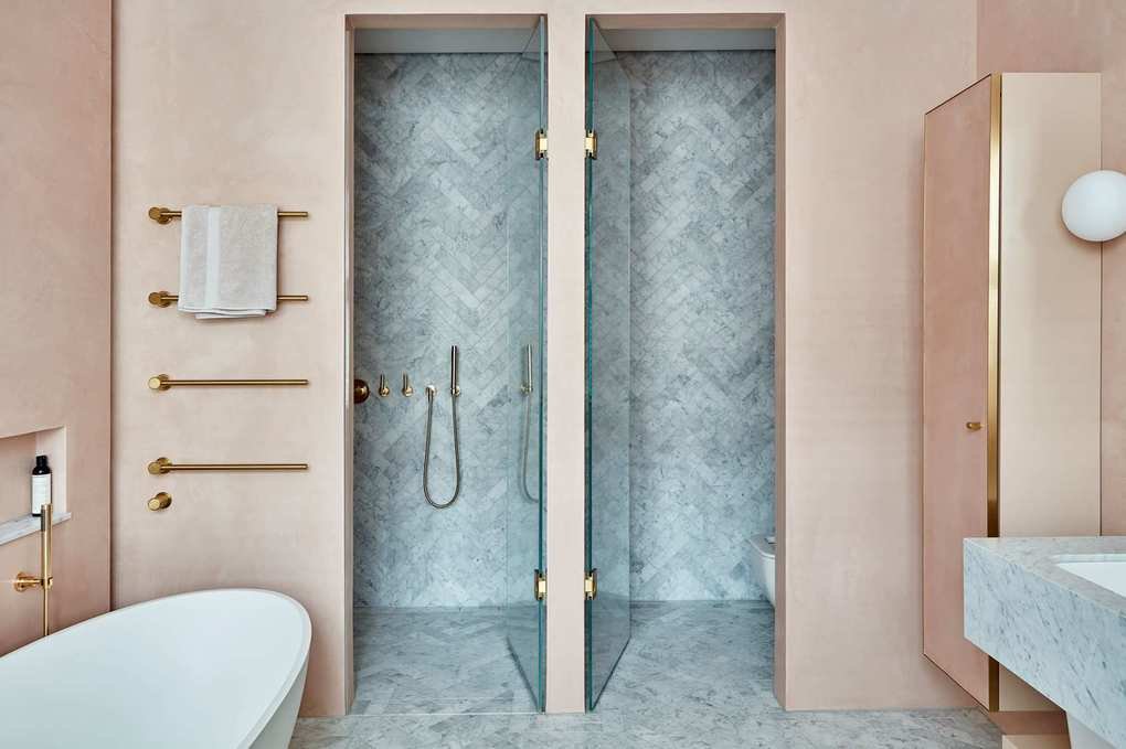Pink bathroom with a walk-in shower