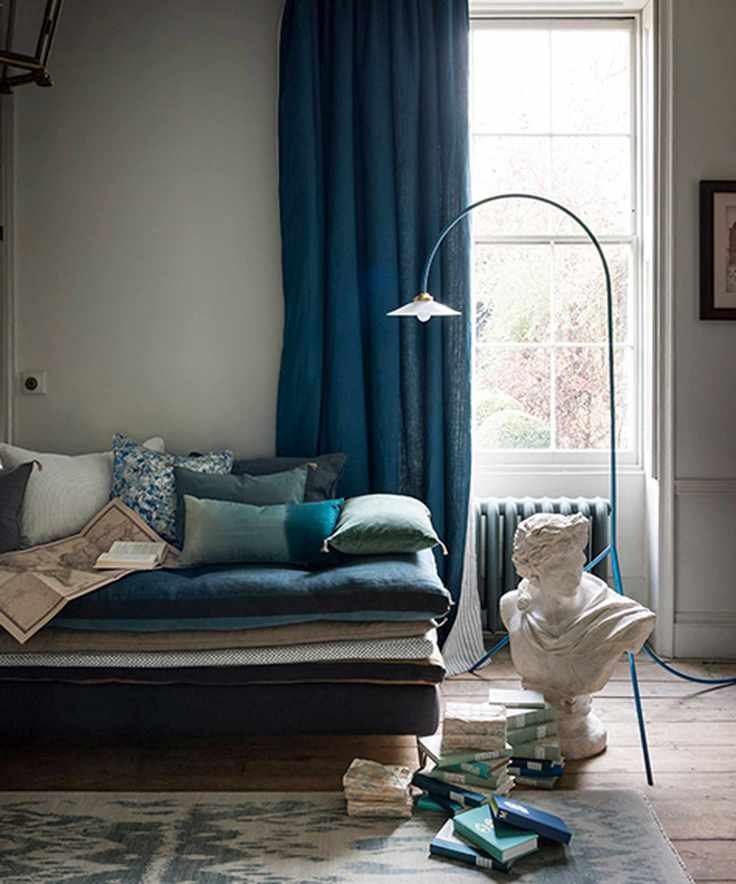 Living room with blue curtains