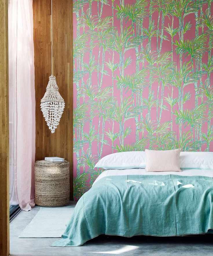 vibrant palm botanical leaf wallpaper in bedroom