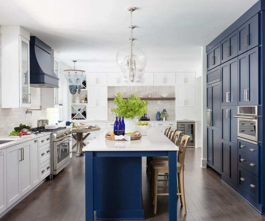 White and blue kitchen with contrasting cabinets