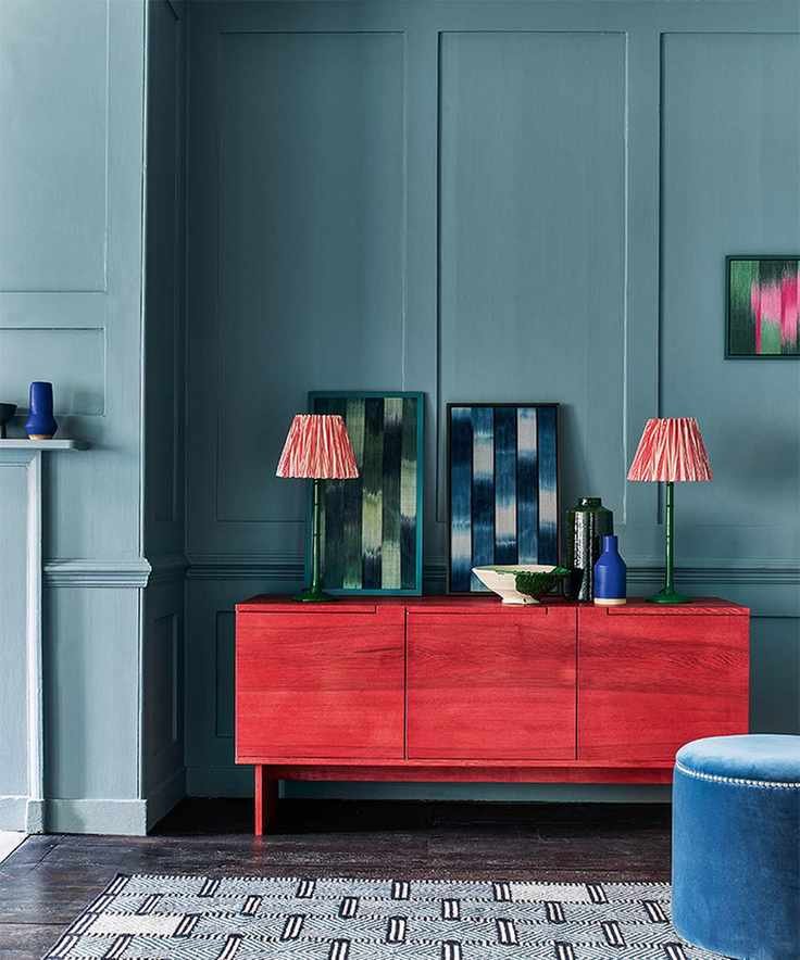 Paneling ideas for walls with blue panelled dining room with red sideboard