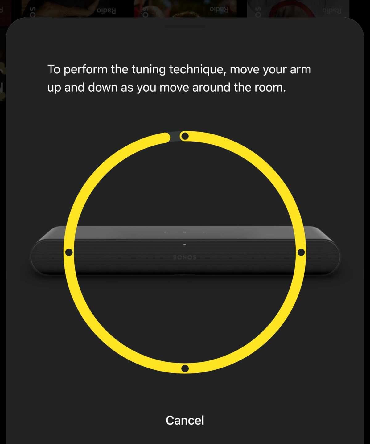 Screenshot of the Sonos app setting up Trueplay for the Sonos Ray soundbar, showing instructions involving moving arm up and down while moving around the room.