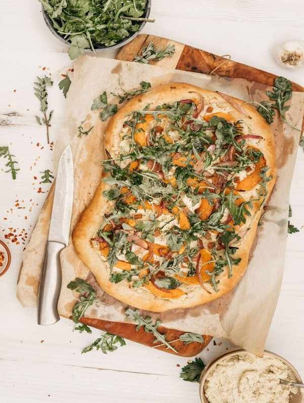 Butternut Squash Pizza Topped with Arugula and Almond Ricotta