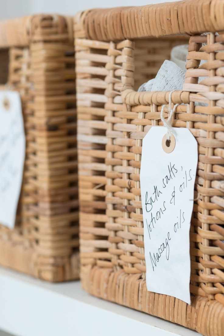 Labeled baskets in bathroom