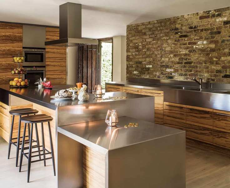 Chef's kitchen with stainless steel sink and countertop