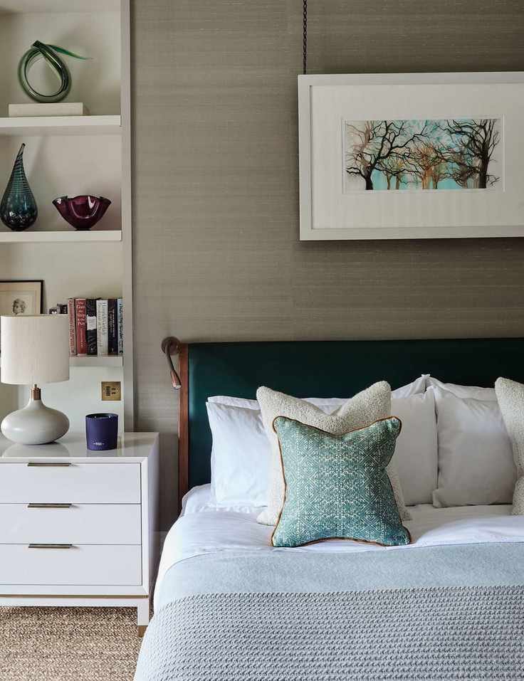Grey bedroom with green accents
