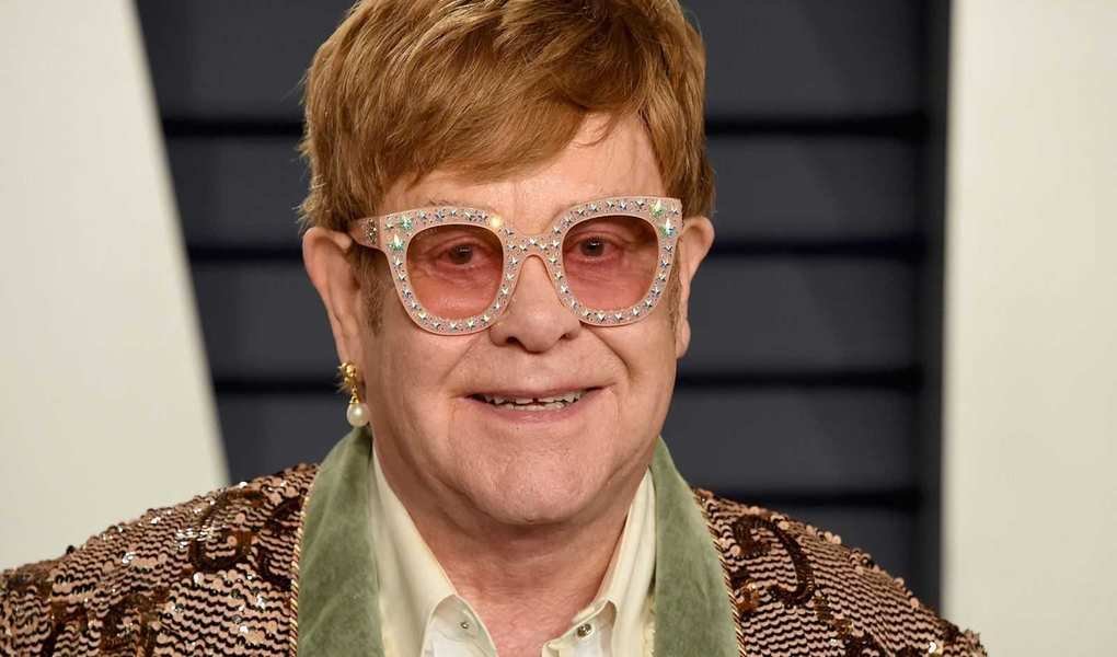 Elton John's Vibrant 2000s Living Room Points to Future Gold Fabric Trends