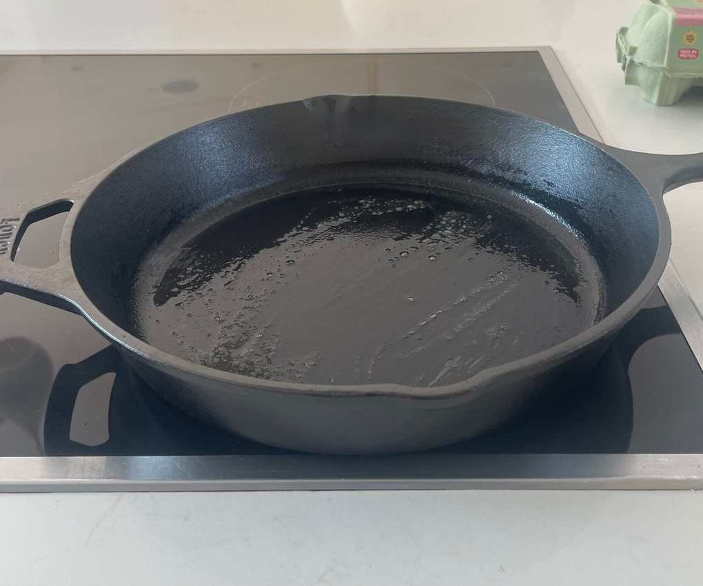 Lodge Chef Collection Skillet on an electric stovetop.