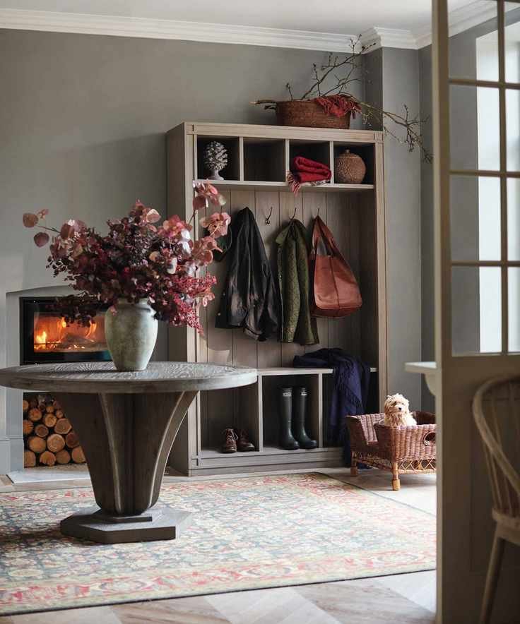 mudroom with storage and wood panelling