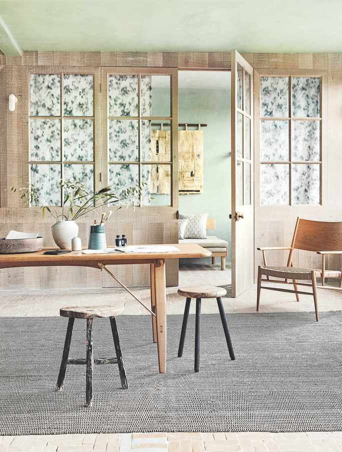 kitchen with glazed internal doors with botanical curtain