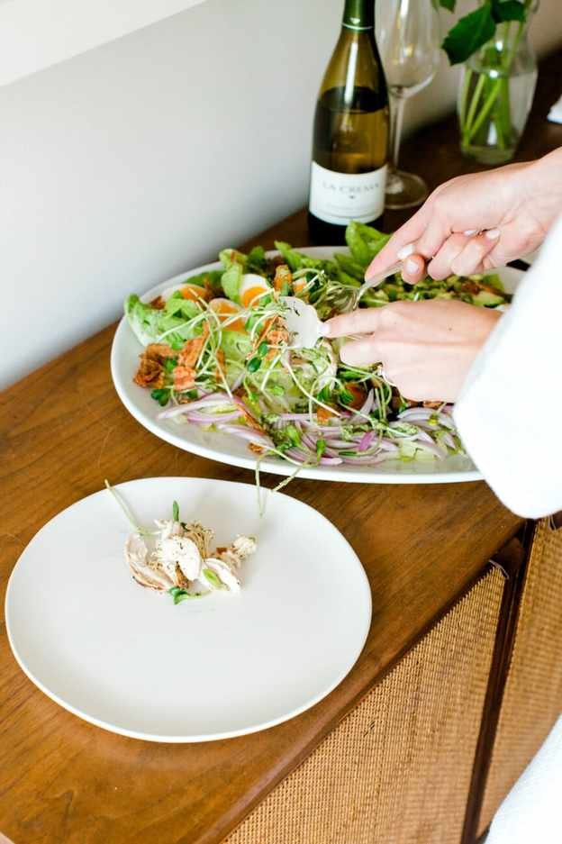 serving pesto chicken cobb salad