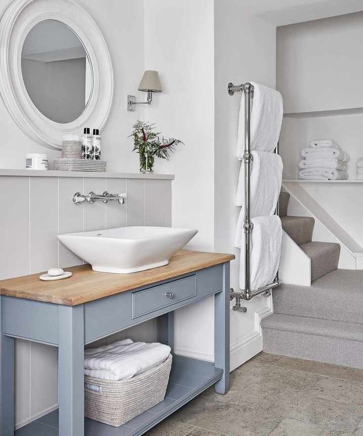 Calming bathroom with organized towel storage