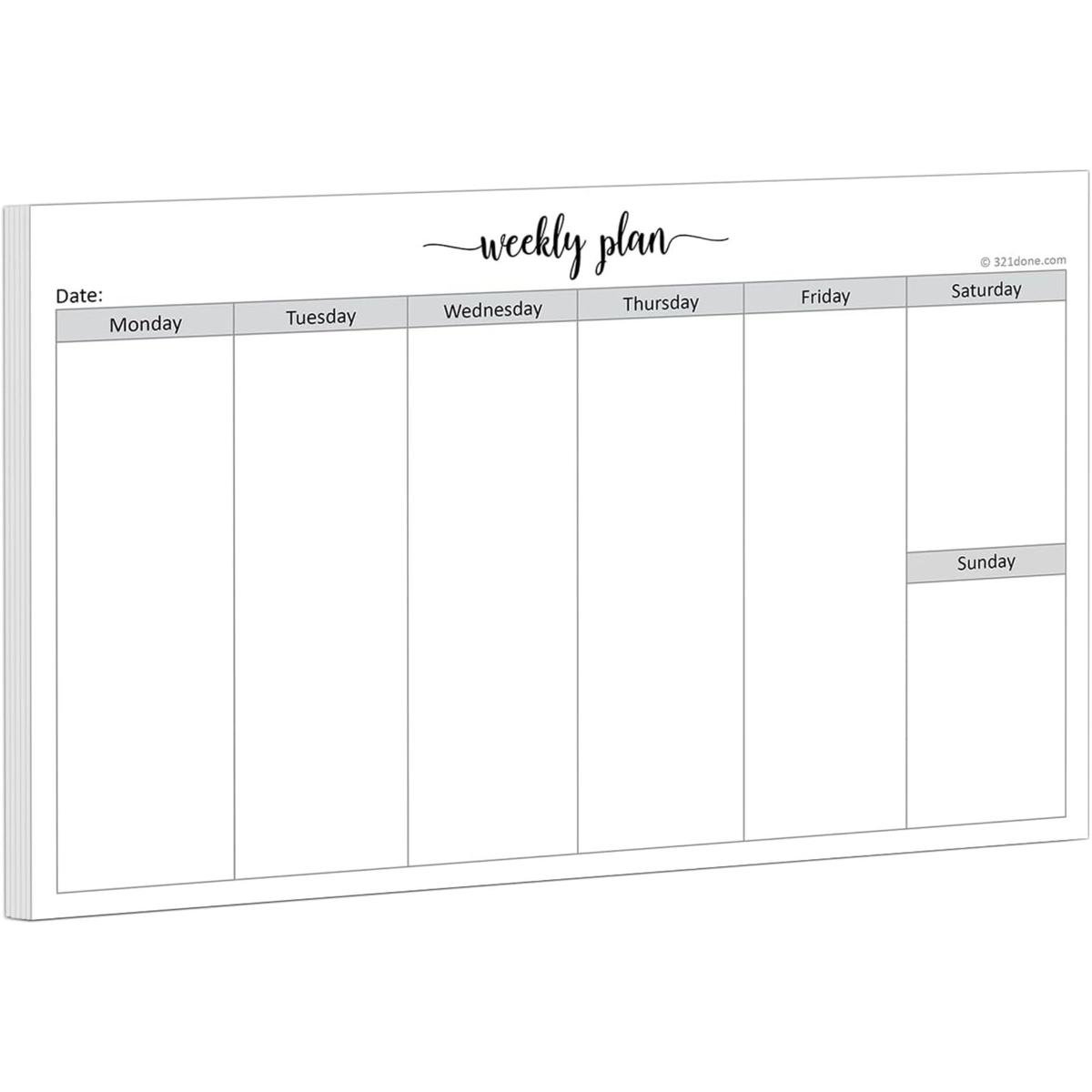A white weekly paper planner