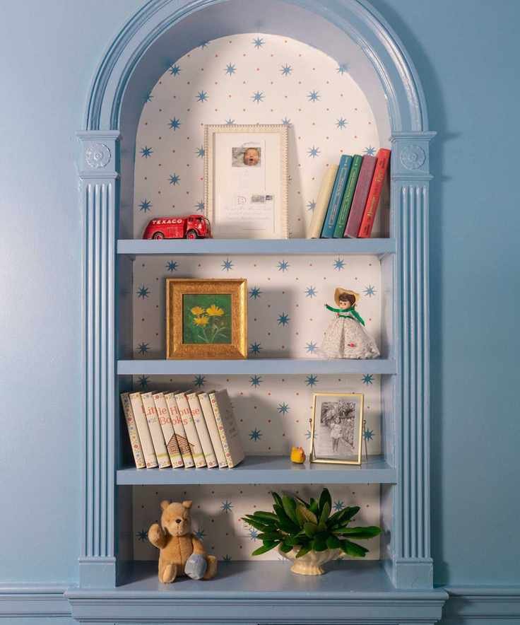 Charming alcove with blue paint and vintage decor