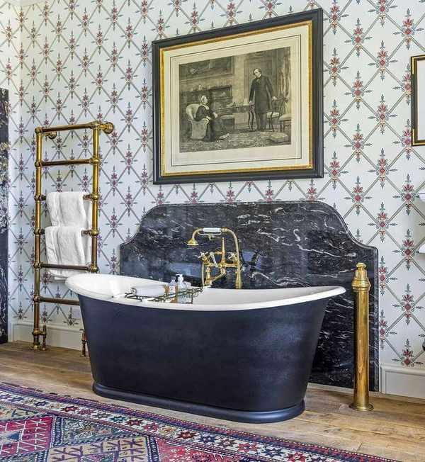 Traditional bathroom with marble wall and freestanding tub