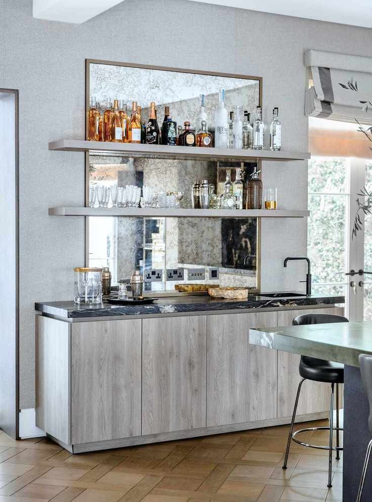 Home bar with open shelving and silver birch wood cabinetry
