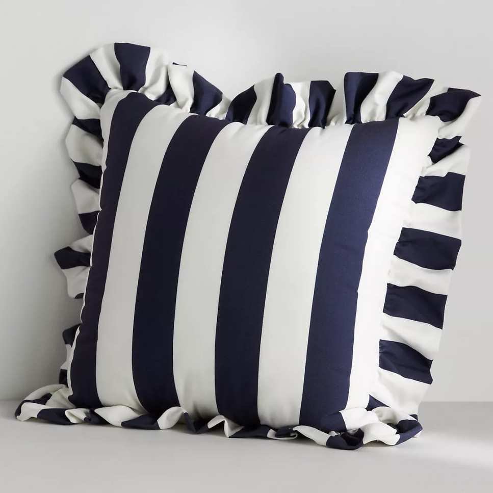 blue and white stripe pillow with ruffle edge