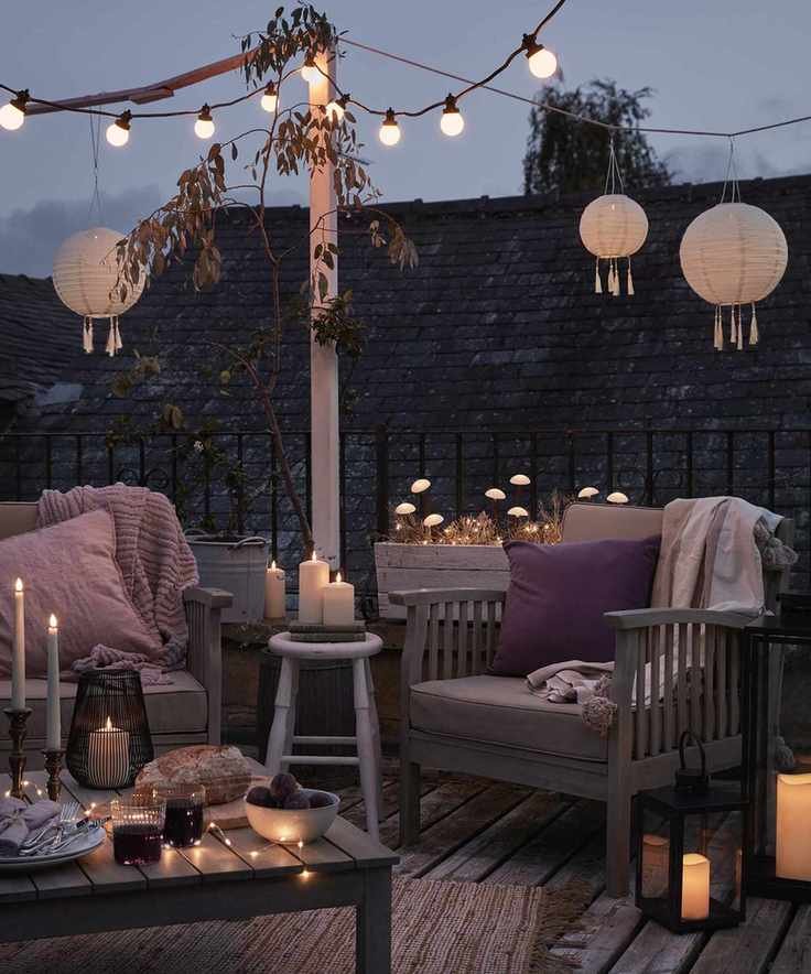 outdoor seating with layered lighting from Lights4fun