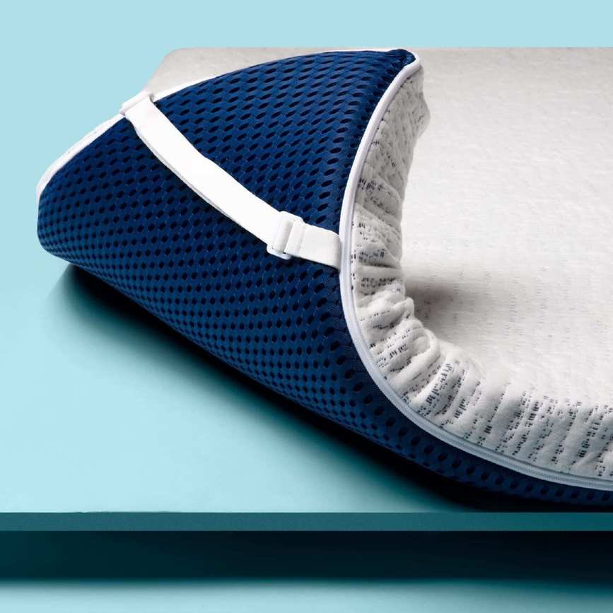 ViscoSoft Select High Density Mattress Topper against a blue background.