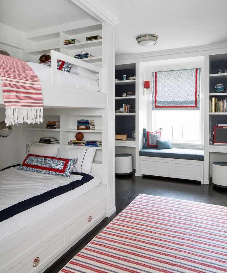 A kids bedroom with bunk beds and vibrant decor
