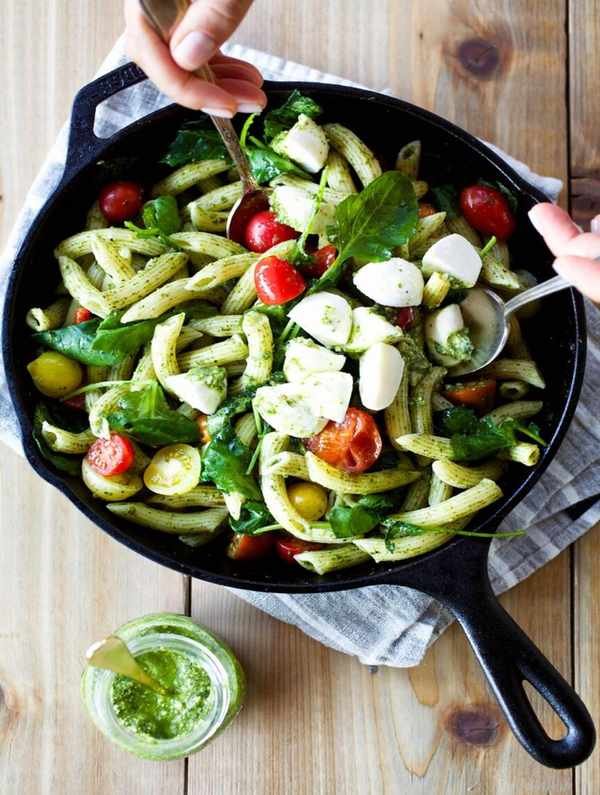 serving caprese pesto pasta