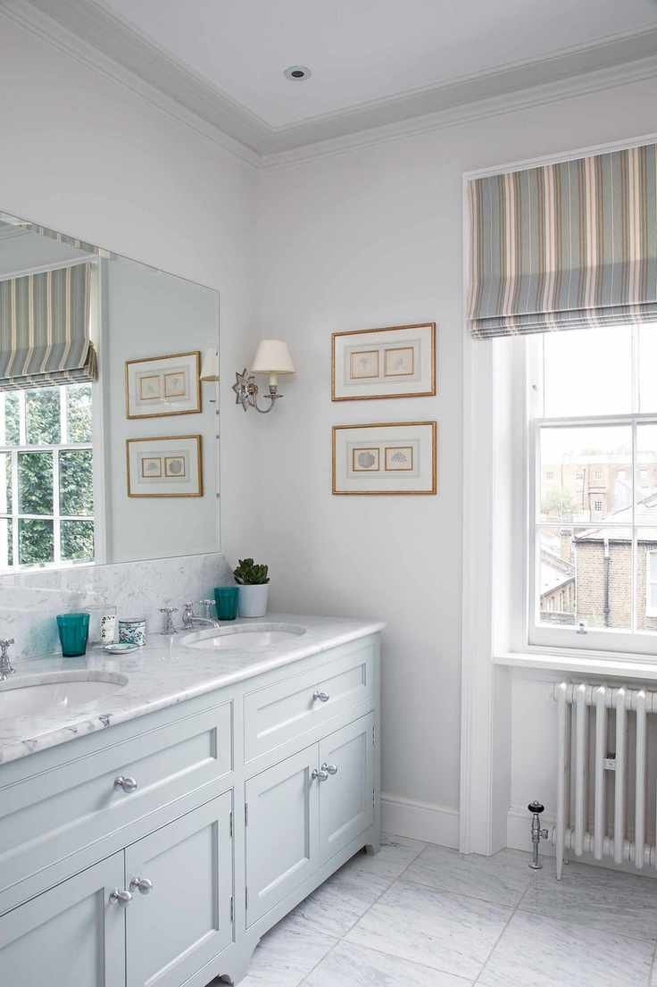 Light gray shaker vanity unit with two sinks