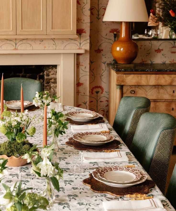 traditional spring table with flowers in bud vases
