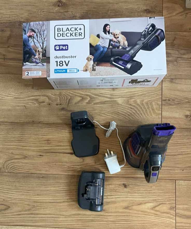 Dustbuster Furbuster AdvanceClean+ Pet handheld vacuum parts on wooden floor