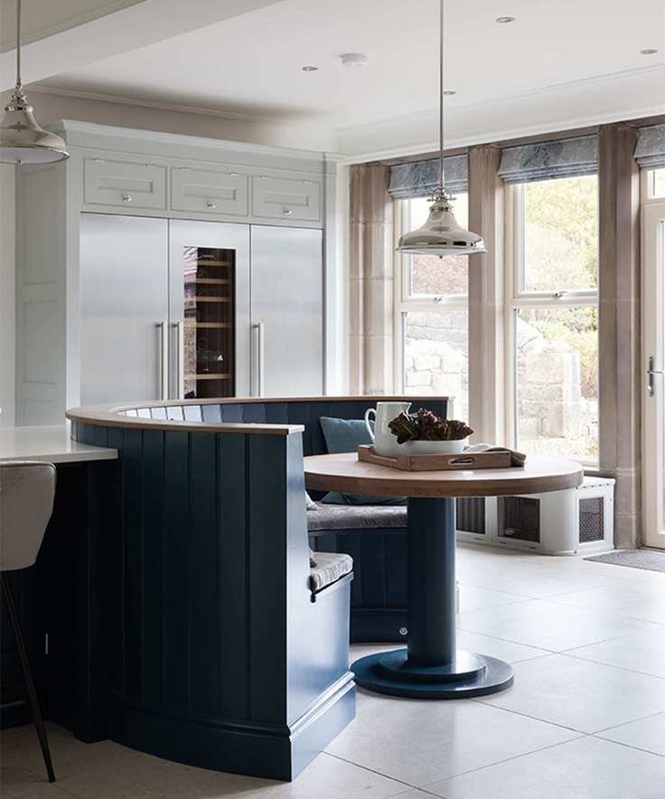 kitchen with circular banquette seating and table