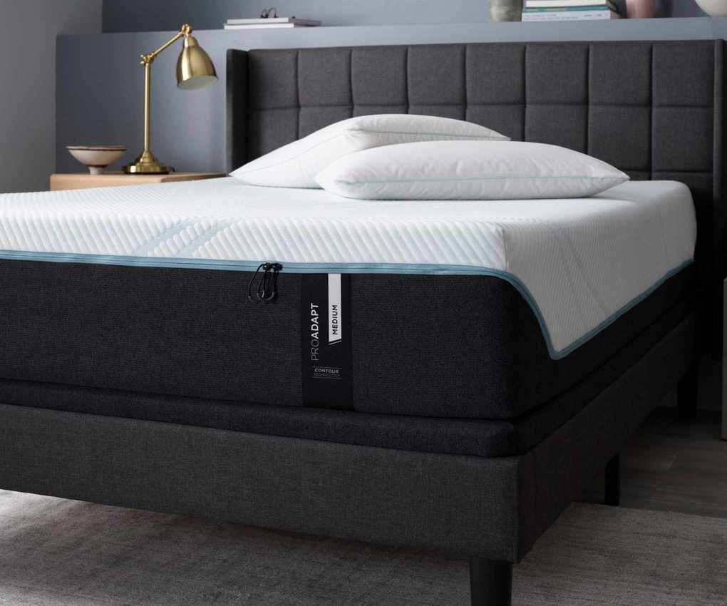 A Tempur-Pedic mattress in a bedroom.