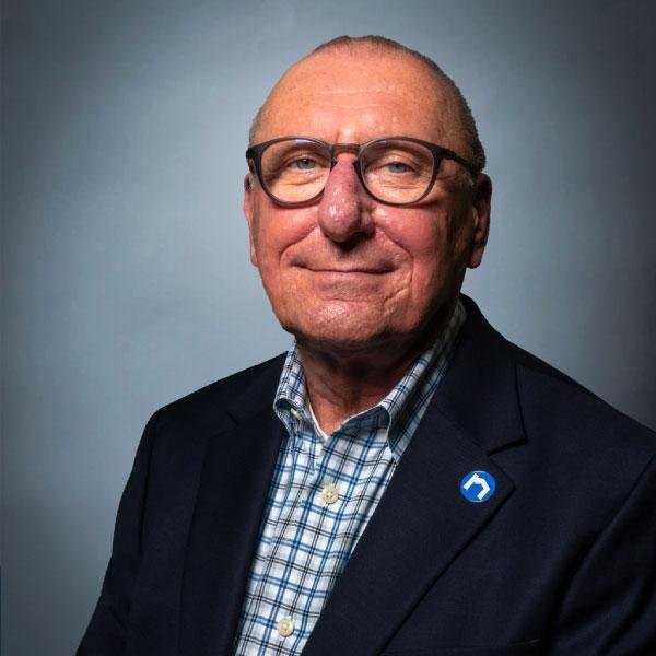 Headshot of Glenn Lewis, a middle-aged man with glasses