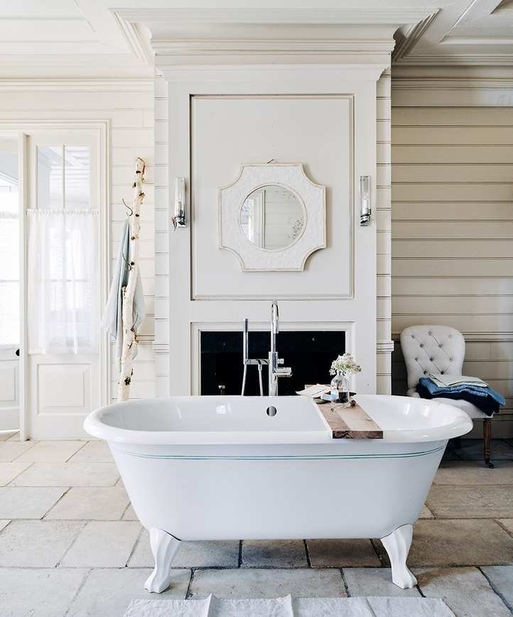 White bathroom with a detailed paneling