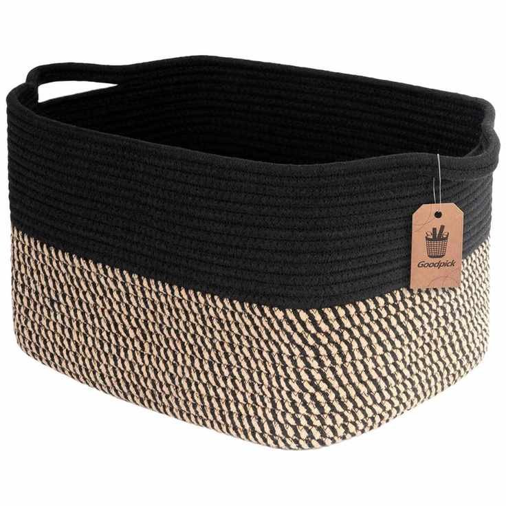 A black and tan rectangular woven storage basket with integrated handles