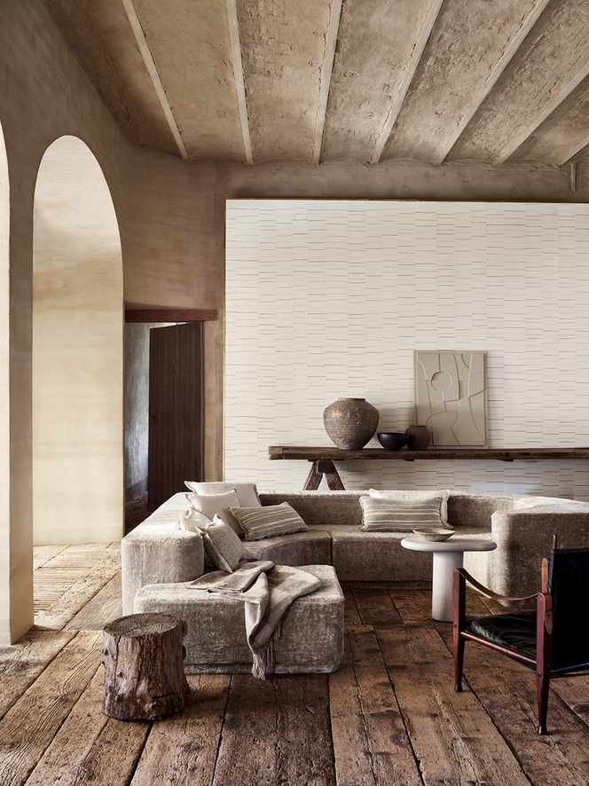 neutral living room with velvet corner sofa