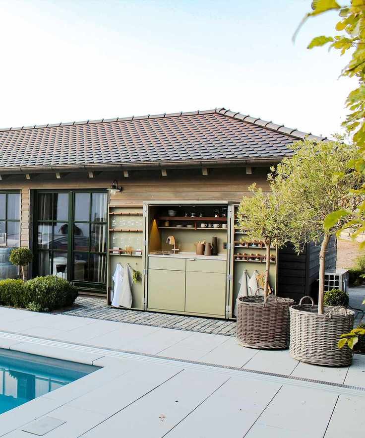 An outdoor bar with a concealed area for storage and utilities.