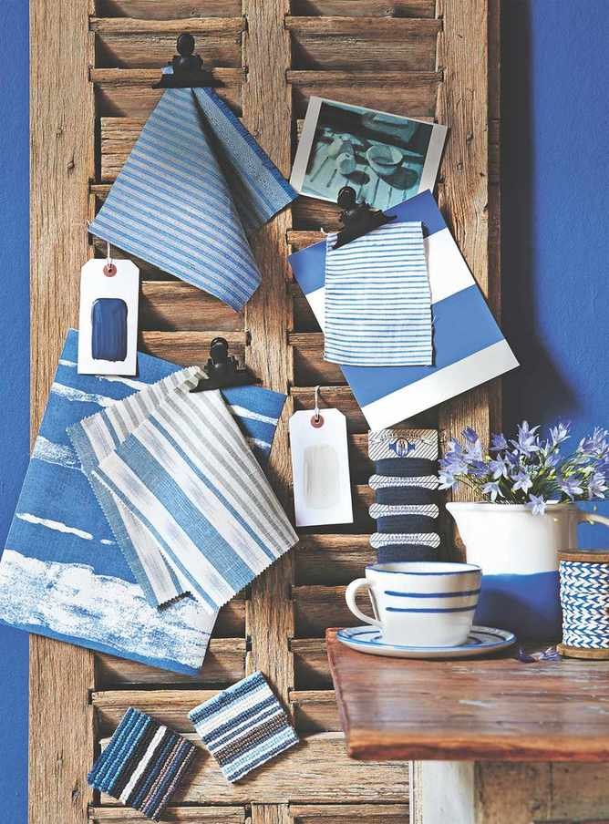 blue moodbard with fabric and paint