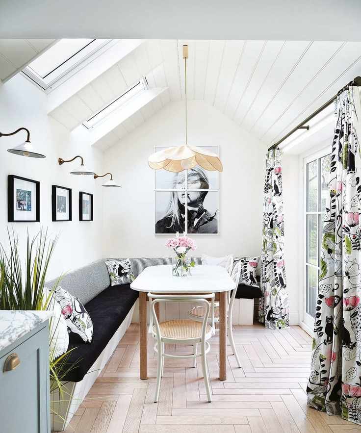 Bright kitchen featuring a low vaulted ceiling with wooden elements