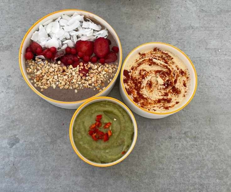 How we test blenders: a smoothie bowl, guacamole, and hummus on the countertop