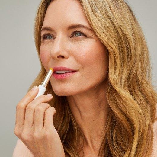 Image of model applying Jane Iredale Just Kissed® Lip and Cheek Stain