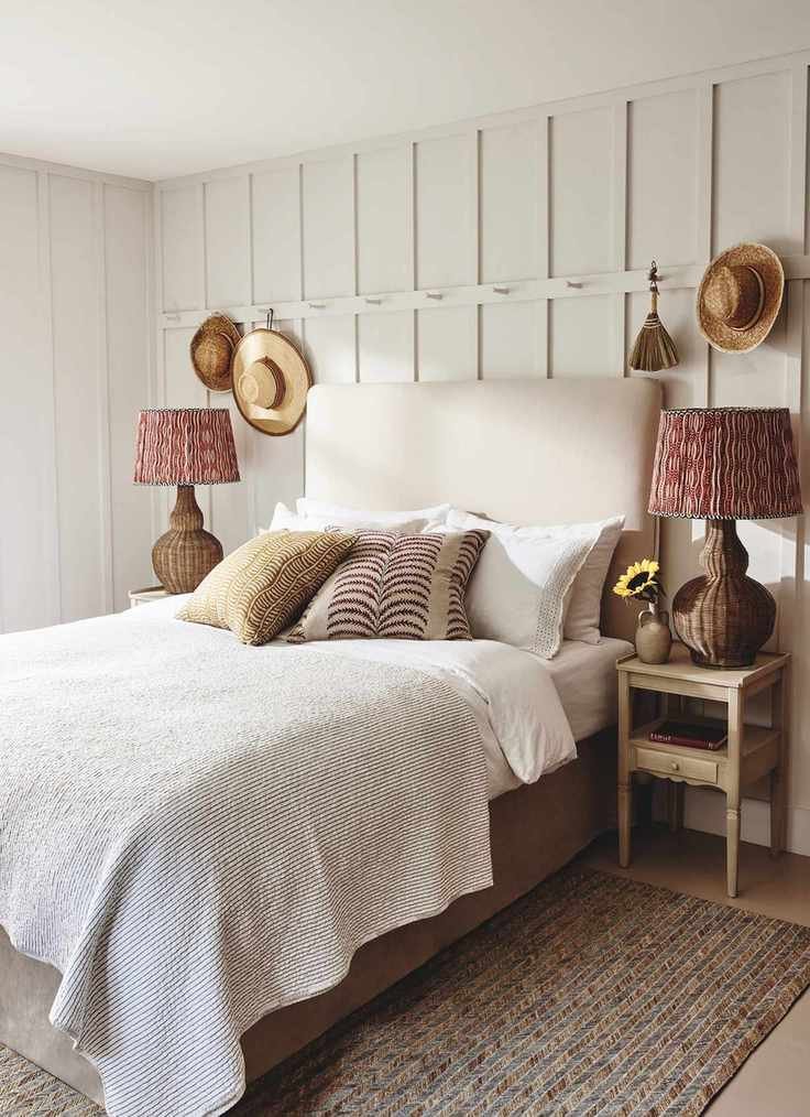 Rustic bedroom featuring rattan table lamps
