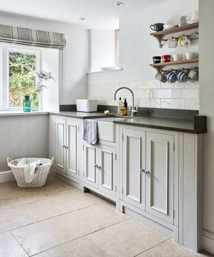 laundry room with cabinets and shelf
