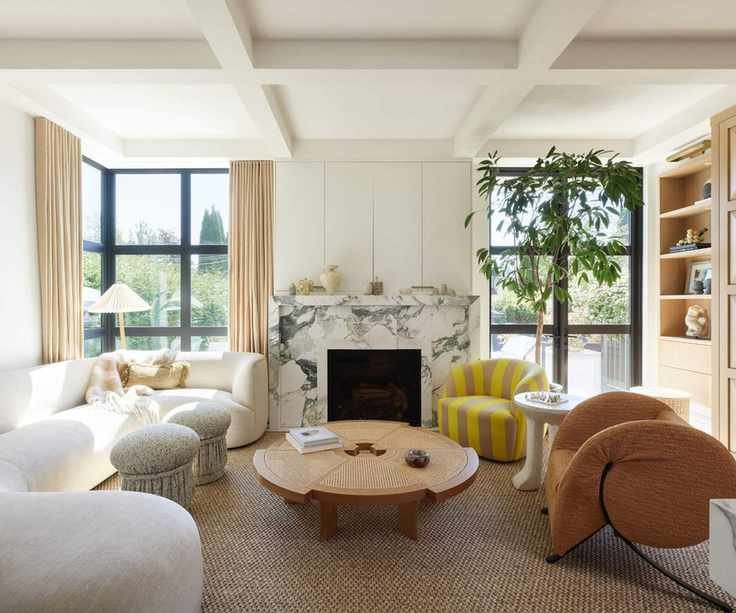 Living room in Vancouver home with marble fire surround