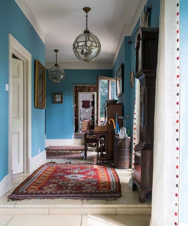 Blue hallway with stone floor