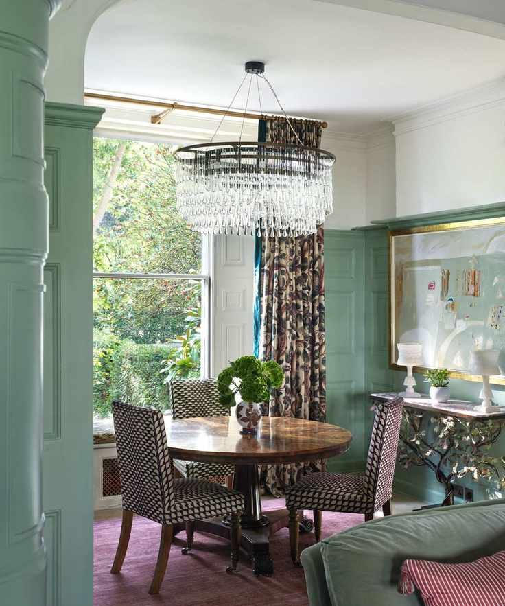 Green dining room with round table