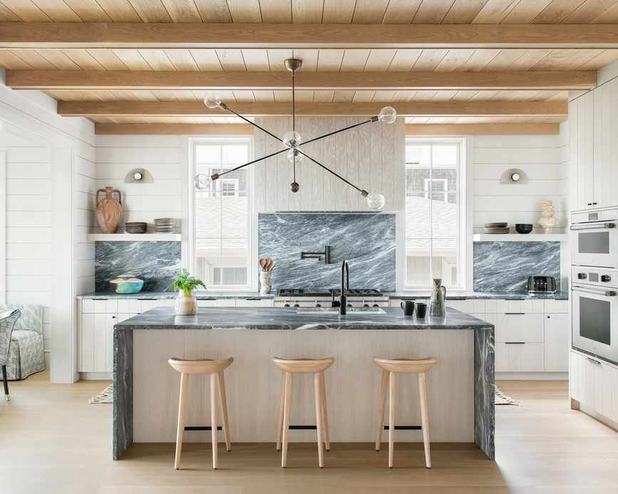 Chic white kitchen showcasing various textures