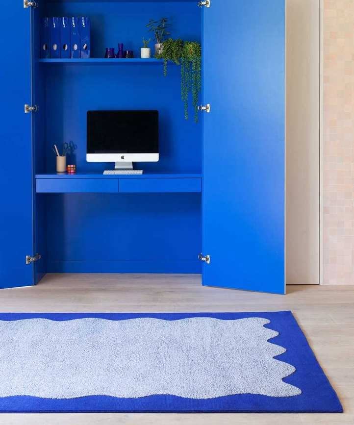 Desk hidden inside a wardrobe