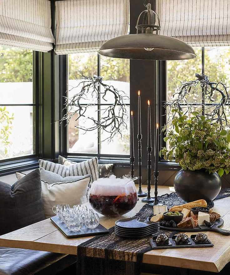 Halloween kitchen decor, wreath on window, halloween table