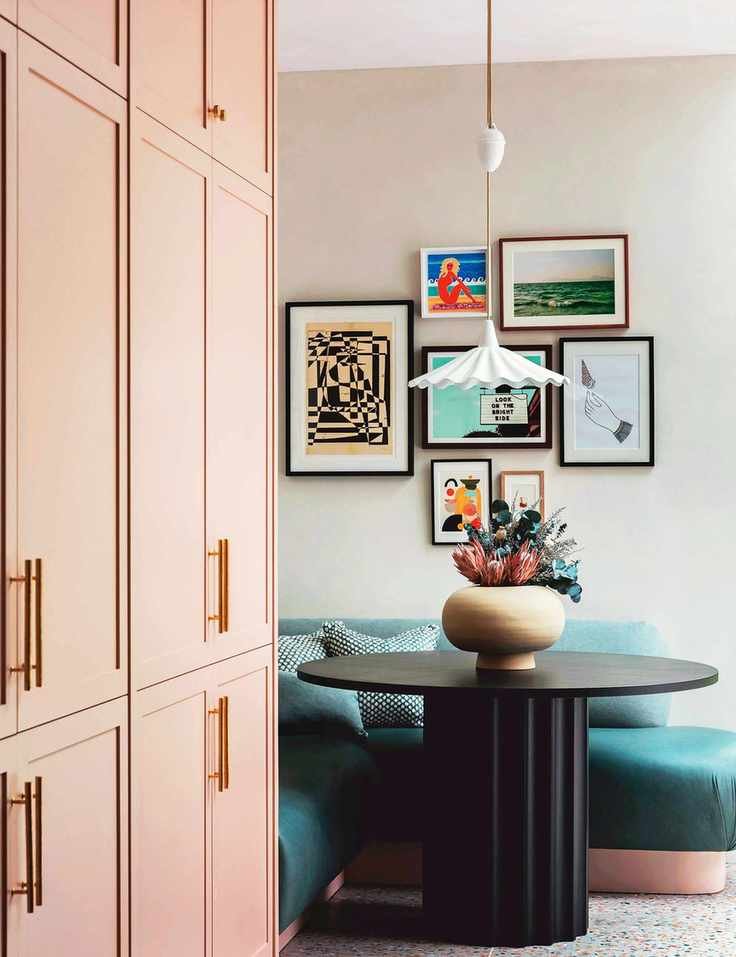 Breakfast room with small round table and banquette seating